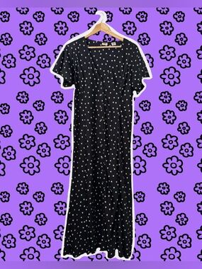 90s style black maxi sundress with all over daisy print